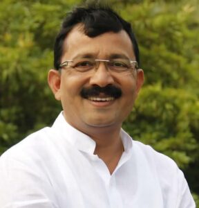 उ