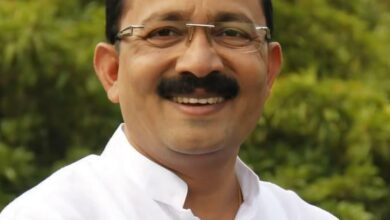 उ